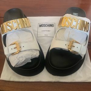 Woman’s Moschino Couture platform style slides